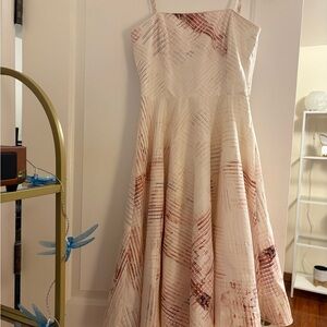 Elegant Cream and Red Patterned Dress
